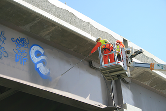 UDOT using a spray gun extension