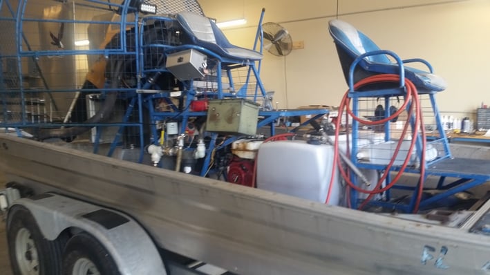 Custom built sprayer mounted on an Airboat 
